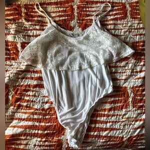 Elegant White Lace Bodysuit